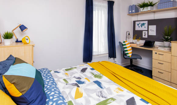 A clean, tidy double room on the  campus